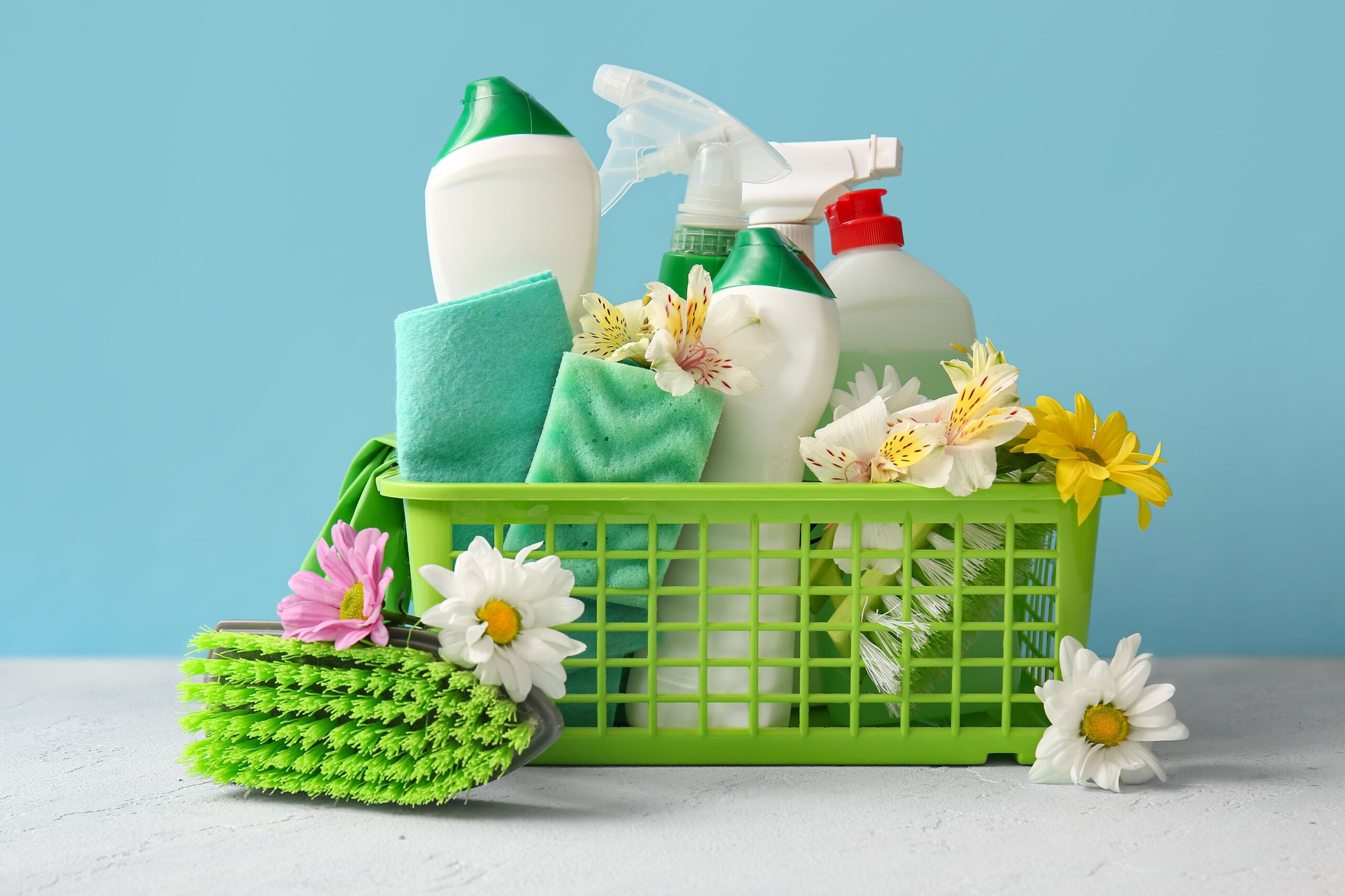 Basket,With,Set,Of,Cleaning,Supplies,And,Spring,Flowers,On